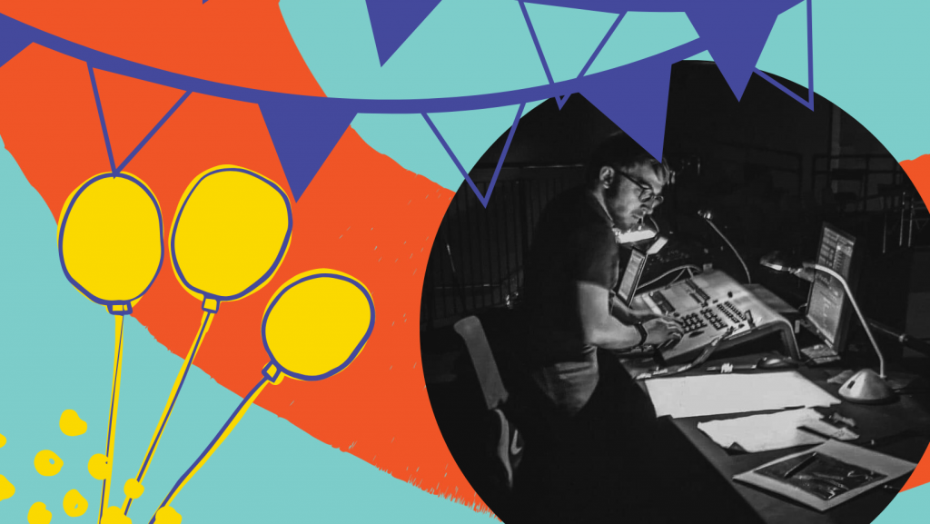 A bright graphic with bunting and balloons frames a photo of a white man with glasses and a beard working at a lighting desk in a theatre balcony