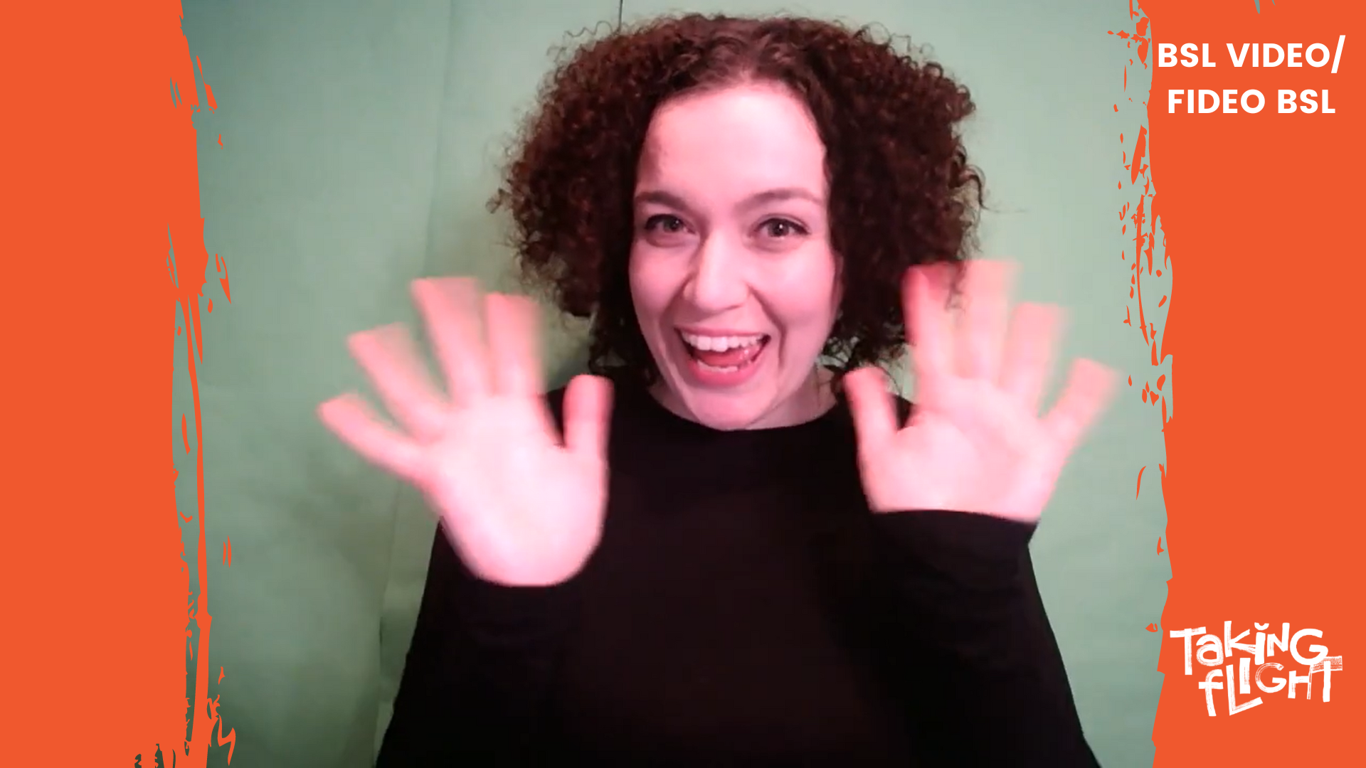 Steph, a woman with curly dark hair signs in a still from a BSL video