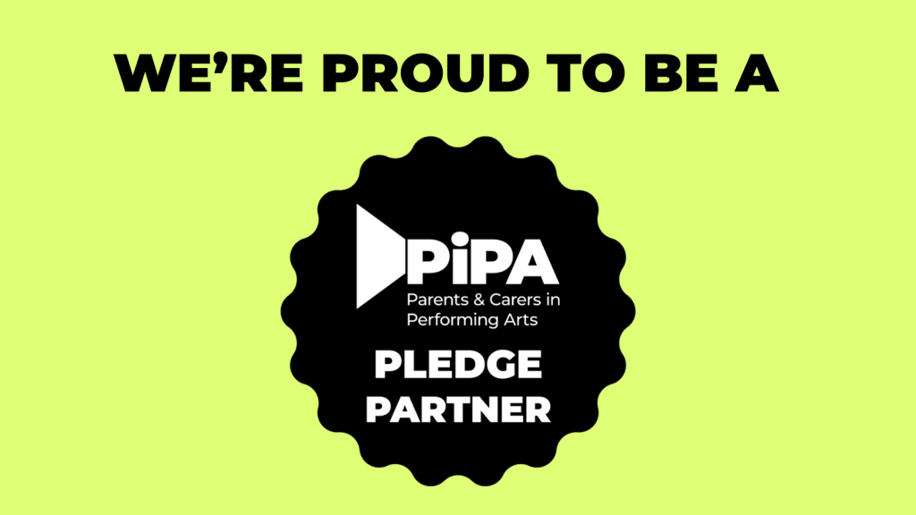 Bright lime green background with bold black text at the top reading “We’re proud to be a.” In the center, a black badge-shaped logo displays “PiPA Parents & Carers in Performing Arts” with the words “Pledge Partner” underneath. At the bottom, smaller black text reads “Making the change for parents and carers in the arts.